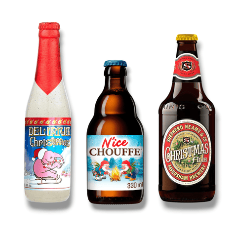 Weihnachtsbier-Mixpaket mit Delirium Noël, N’Ice Chouffe und Shepherd Neame Christmas Ale auf weißem Hintergrund